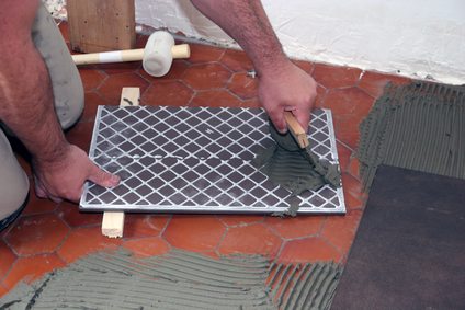 Tiler at work